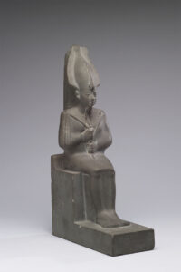 Osiris con los atributos del faraón y la corona Atef.